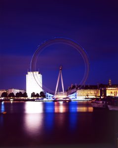 View from Victoria Embankment at dusk. The London Eye by Marks Barfield Architects