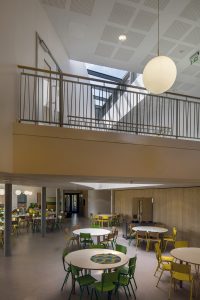 dinning void - University of Cambridge Primary School by Marks Barfield Architects