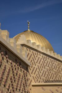 Cambridge Mosque Brick tile cladding, crenulations & dome reflected in rooflight by Marks Barfield architects, photography by Morley von Sternberg